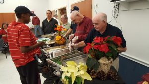Brother Knights serving Thanksgiving Dinner at the NAMI Sunday Supper.