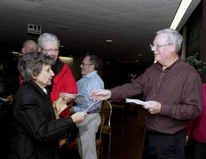 Passing out programs to guests at St. John's Annual Christmas concert on December 8, 2016.